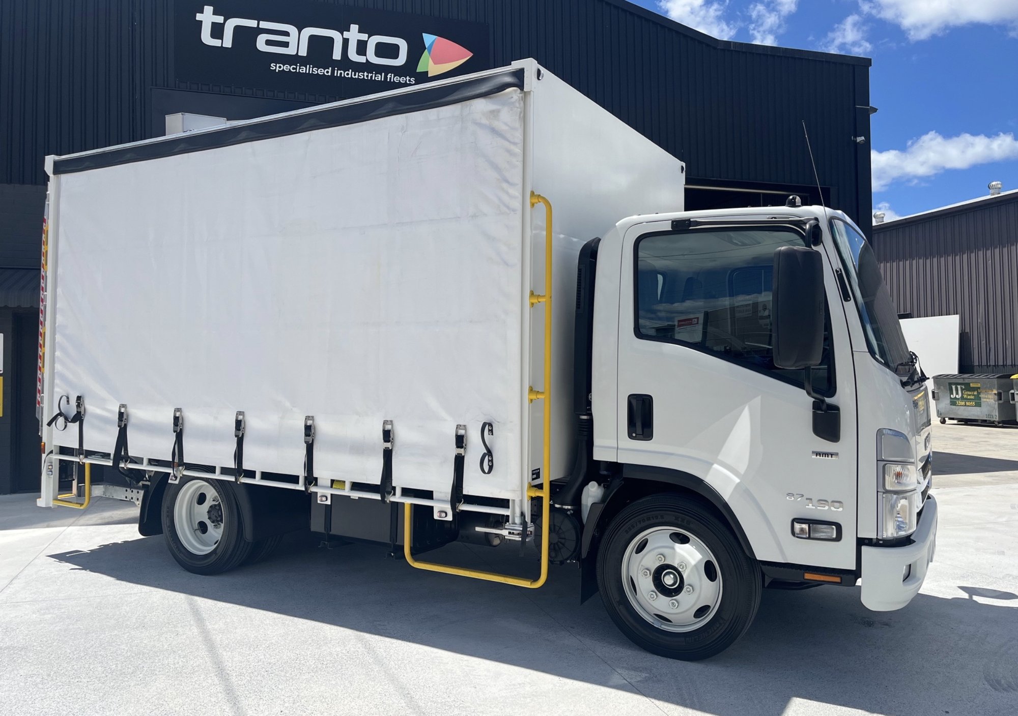 Tranto curtainsider on an Isuzu N Series outside the Tranto shed